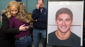 Centre County DA Stacy Parks Miller hugs Evelyn Piazza as her husband Jim stands in the background after announcing the findings in the investigation of Timothy Piazza at the Beta Theta Pi fraternity. (Joe Hermitt/PennLive)
