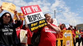 Fast food workers demonstrate for higher pay in Des Moines on May 23, 2019.