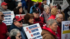 Iowans living in or near the path of proposed carbon pipelines rallied at the Statehouse Tuesday in support of a bill that would restrict the use of eminent domain for such projects.