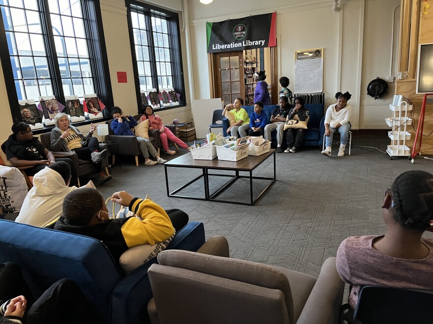 Elementary students in a large group discussion.