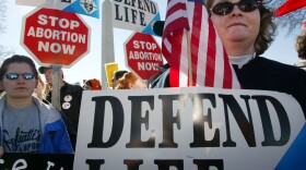 Activists Lori Gordon (R) and Tammie Miller (L) of Payne, Ohio, take part in the annual "March for Life" event January 22, 2002 in Washington, D.C.