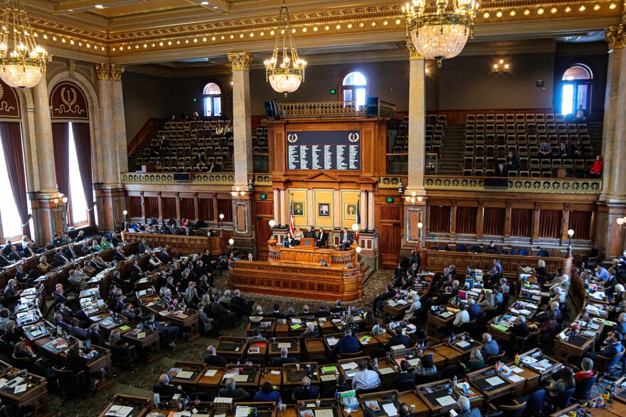 Iowa Supreme Court Justice Susan Christensen stands before a joint session of the General Assembly to give the 2024 Condition of the Judiciary address.