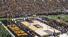 Players transition down the court during the lowa Hawkeyes women's basketball team's NCAA Crossover at Kinnick exhibition basketball game against the DePaul Blue Demons in lowa City on Sunday, Oct. 15.