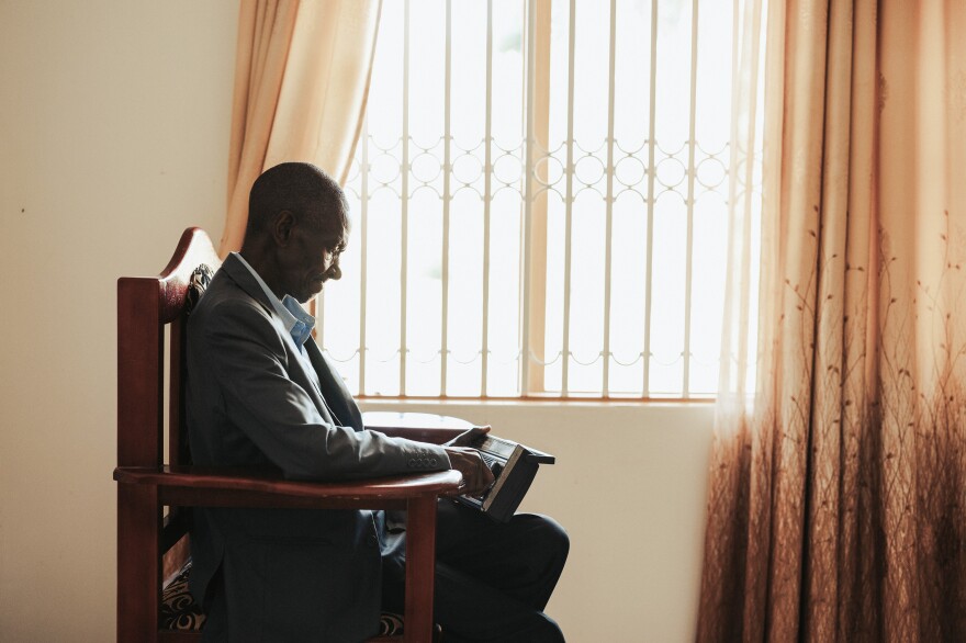 Makanga Kamulegeya likes to sit by his window with his radio and watch passersby. "The wheels of time have changed most things. The one thing time has not touched is my capacity for life and living," he says.