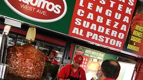 The front counter with its list of meats and big trompo rotisserie is as close as you'll get to a menu at Taquitos West Ave in San Antonio.