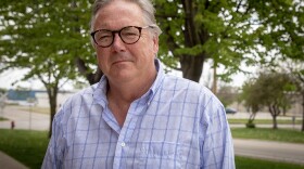 Dr. Chris Jones, author of "The Swine Republic," poses for a photo outside IPR's Iowa City Studios a few days ahead of his retirement as a Research Engineer at University of Iowa's IIHR .