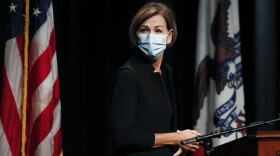 Iowa Gov. Kim Reynolds arrives at a news conference to update the state's response to the coronavirus outbreak, Tuesday, Aug. 4, 2020, in Johnston, Iowa.