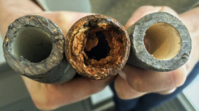 An image provided by the Environmental Protection Agency shows examples of a lead pipe, left, a corroded steel pipe, center, and a lead pipe treated with protective orthophosphate. The EPA is only now requiring water systems to take stock of their lead pipes, decades after new ones were banned.