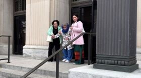 Kim Phuong Taylor (on the right) leaves the Federal Courthouse in Sioux City on Monday Nov. 20 when jury deliberations got underway.