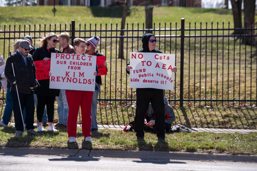 Supporters of Iowa's Area Education Agencies demonstrated outside the governor's mansion to protest proposed changes working through the legislature.