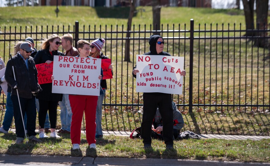 Supporters of Iowa's Area Education Agencies demonstrated outside the governor's mansion to protest proposed changes working through the legislature.