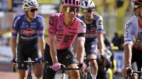 Rigoberto Urán crosses the finish line of stage 12 of the 110th Tour de France, July 13, 2023, in Belleville-en-Beaujolais, France.