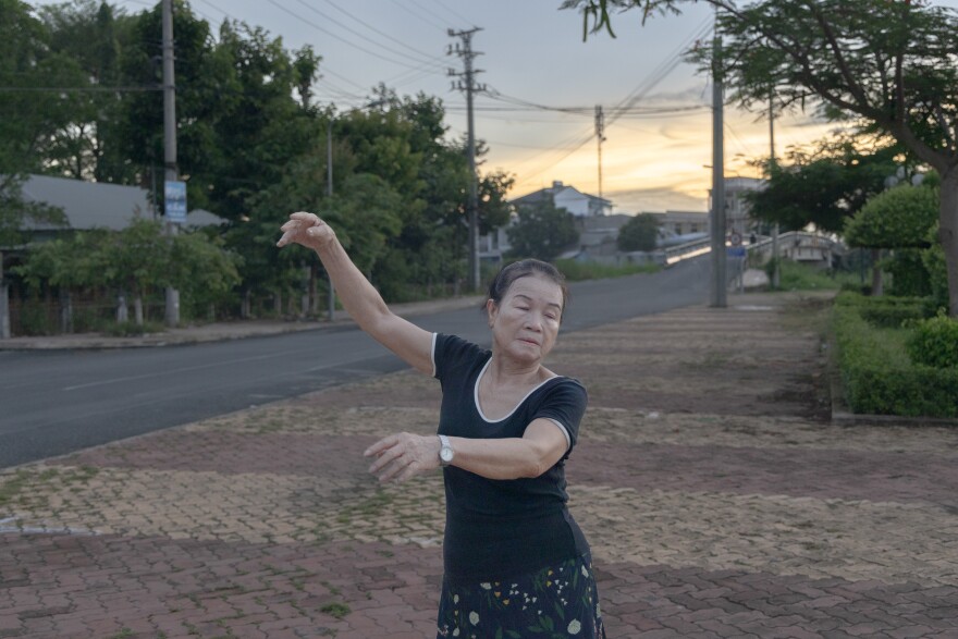 For an hour each evening, Nguyen brings her small radio to the river and performs a dance similar to the tango.