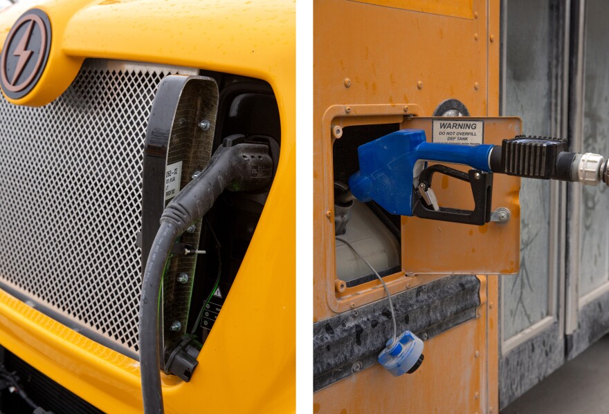 An electric school bus charges, left, while another bus is is filled with diesel exhaust fluid on Monday, Nov. 20, 2023, in Center, Mo. While most of the Ralls County School District’s buses are powered by gas or diesel, it has two newly-added electric buses. The electric buses were obtained via Inflation Reduction Act-funded grants, meant to provide rural school districts with electric buses. 