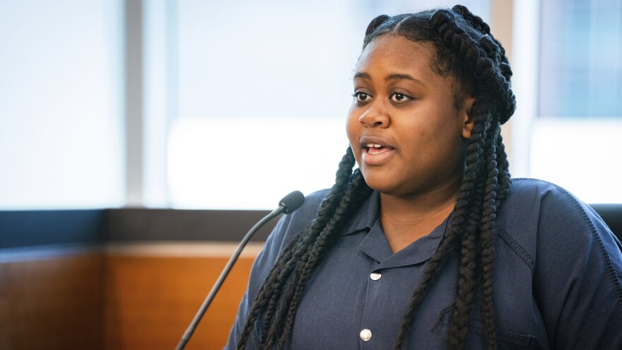 Pieper Lewis speaks during a sentencing hearing on Tuesday in Des Moines, Iowa. Lewis, who was initially charged with first-degree murder after she stabbed her accused rapist to death in June 2020, was sentenced to five years of closely supervised probation and ordered to pay $150,000 restitution to the man's family.