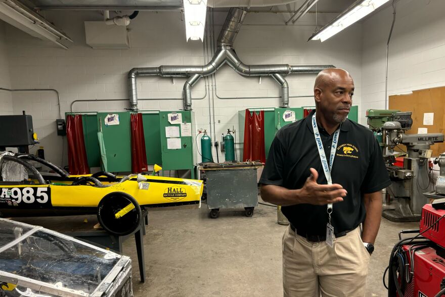 Associate Principal Robert Johnson leads a tour of the Career and Technical Education spaces at Kennedy High School on November 19, 2023.