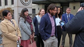 Dan Novack, an attorney for the publisher Penguin Random House, speaks with reporters after an injunction hearing against SF 496, an Iowa law that bans schools from having books in their libraries that include descriptions of sexual acts.