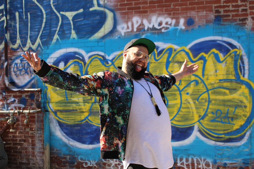 Madison Ray poses outside xBk, a music venue in Des Moines, before the taping of Juneteenth: The Movement 2021, a production he co-produced with IPR, xBk and Iowa PBS.