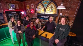 Since the Maintenance Shop opened 50 years ago, ISU students have been the driving force that keeps the performance space rocking. Pictured here at the M-Shop bar are some of the students and staff who have helped lead the venue in recent years. From right: Aryana Bermeo, Student Union Board (SUB) M-Shop director; Jim Brockpahler, entertainment programs coordinator; Allison Talyat, SUB M-Shop director; Poni Okene, SUB special events director; Hassein Rife, former M-Shop head audio tech and former M-Shop student director; Dorothy Sargent, SUB vice president of administration; and Emily Durbala, SUB performing arts director.