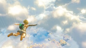 Link is above the clouds of Hyrule in a skydive. 