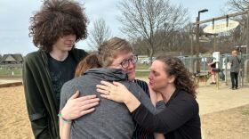 Tara McGovern embraced friends and family after hearing their innocent verdict on March 13, 2024 at Thornberry Dog Park in Iowa City.