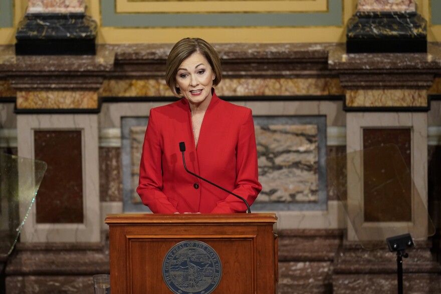 Iowa Gov. Kim Reynolds delivers her Condition of the State address before a joint session of the Iowa Legislature, Tuesday, Jan. 12, 2021, at the Statehouse in Des Moines, Iowa. (AP Photo/Charlie Neibergall)