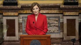 Iowa Gov. Kim Reynolds delivers her Condition of the State address before a joint session of the Iowa Legislature, Tuesday, Jan. 12, 2021, at the Statehouse in Des Moines, Iowa. (AP Photo/Charlie Neibergall)