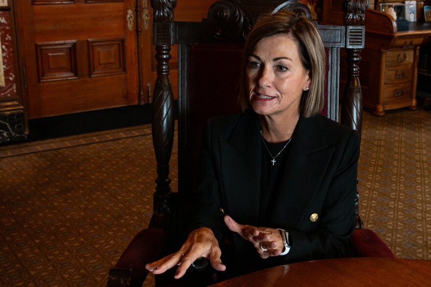 Gov. Kim Reynolds in her office at the Iowa State Capitol during an interview with Iowa Public Radio's Clay Masters on Aug. 9.