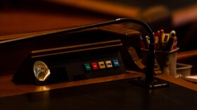 Machine with voting decision buttons at each lawmaker's desk in the Iowa House of Representatives. 