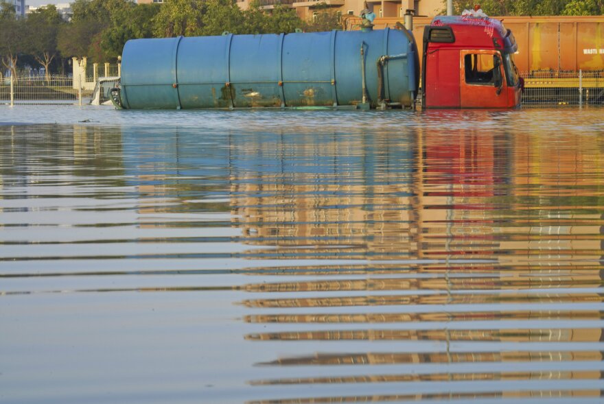 A tanker truck sits abandoned in floodwater in Dubai, United Arab Emirates, Thursday. The United Arab Emirates attempted to dry out Thursday from the heaviest rain the desert nation has ever recorded, a deluge that flooded out Dubai International Airport and disrupted flights through the world's busiest airfield for international travel.