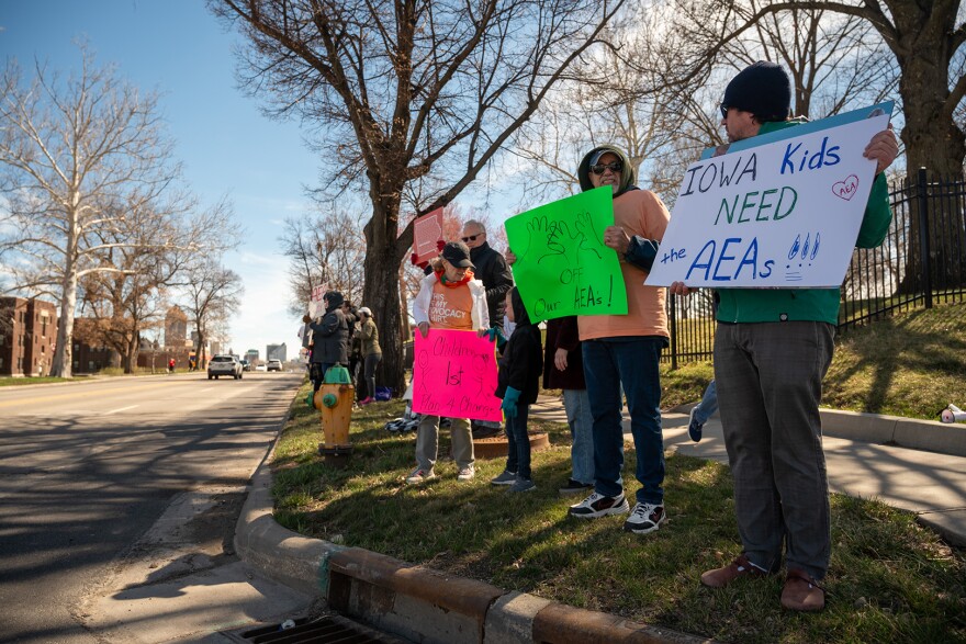 Supporters of Iowa's Area Education Agencies demonstrated outside the governor's mansion to protest proposed changes working through the legislature.