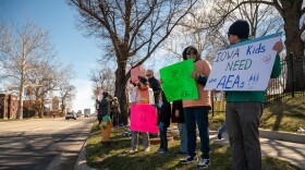 Supporters of Iowa's Area Education Agencies demonstrated outside the governor's mansion to protest proposed changes working through the legislature.