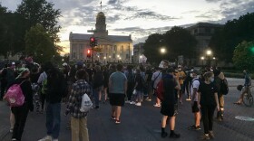 During the summer of 2020, it was common for a crowd of protesters to depart from Iowa City's Pentacrest to march through streets. Pictured, protesters march into Clinton Street on April 30, 2020.