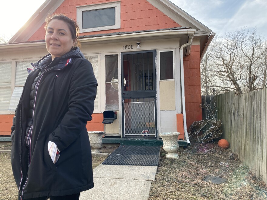  Marisela Orozco ,46,  in front of the house in Kansas City, Missouri she thought she owned after she paid her last installment of  $500 on a contract for deed agreement.  But the owner disappeared after collecting the last payments. She’s been trying to locate him  since 2018.