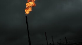 Flared natural gas is burned off at a natural gas plant. Methane, the main ingredient in natural gas, can leak from natural gas plants and pipelines.