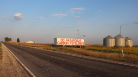 A semi-trailer emblazoned with the slogan, “No hazardous carbon pipelines,” greets drivers entering the town of Fremont on Hwy 23. Emergency responders in small towns such as Fremont have raised safety concerns regarding CO2 pipelines and their ability to deal with a rupture.