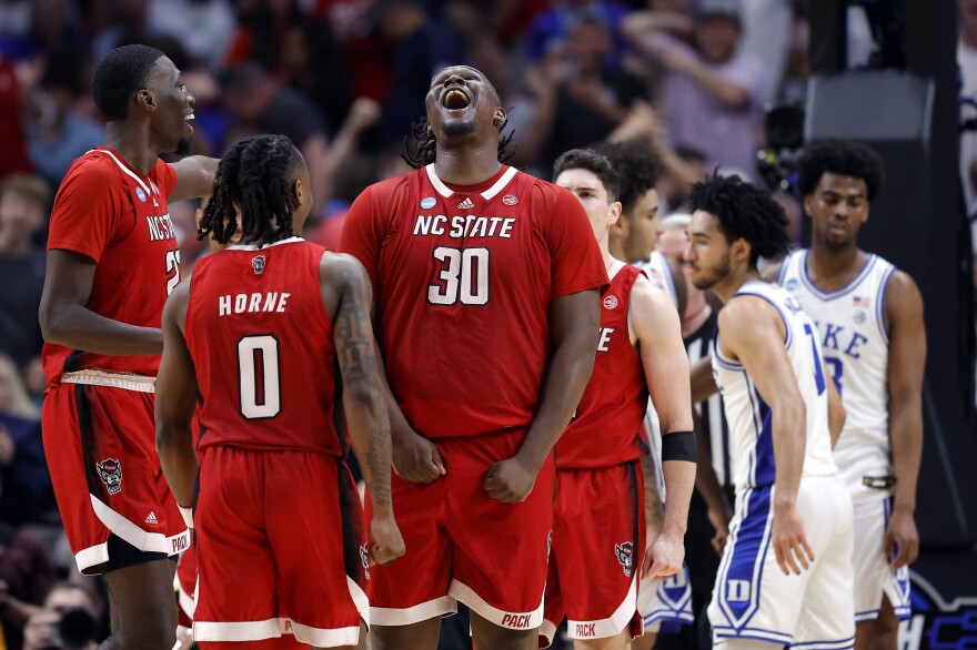 Burns adopts a serious, focused demeanor during games. But in the final minutes of the Elite Eight matchup with Duke, as N.C. State's lead grew, Burns showed some emotion.