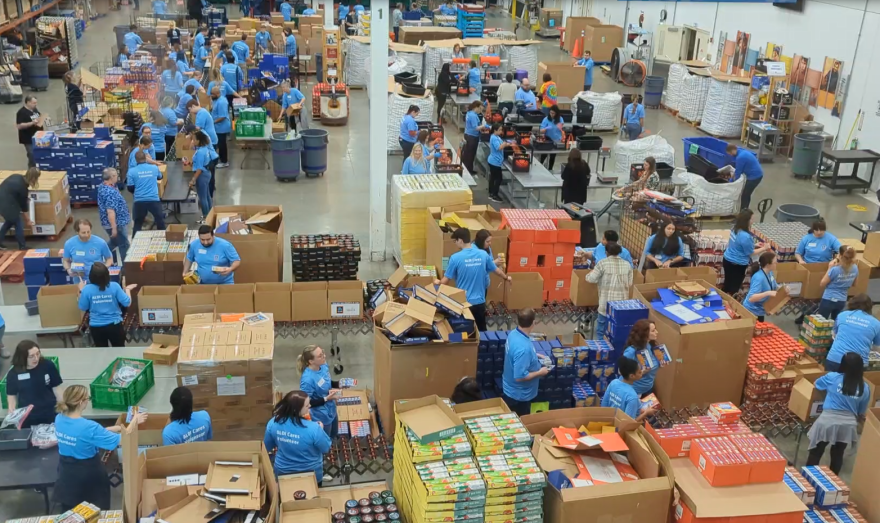 Volunteers working at the Northern Illinois Food Bank. It brought in 400,000 more pounds of food because of a federal program that connects farms with food pantries in an effort to cut down on food waste.