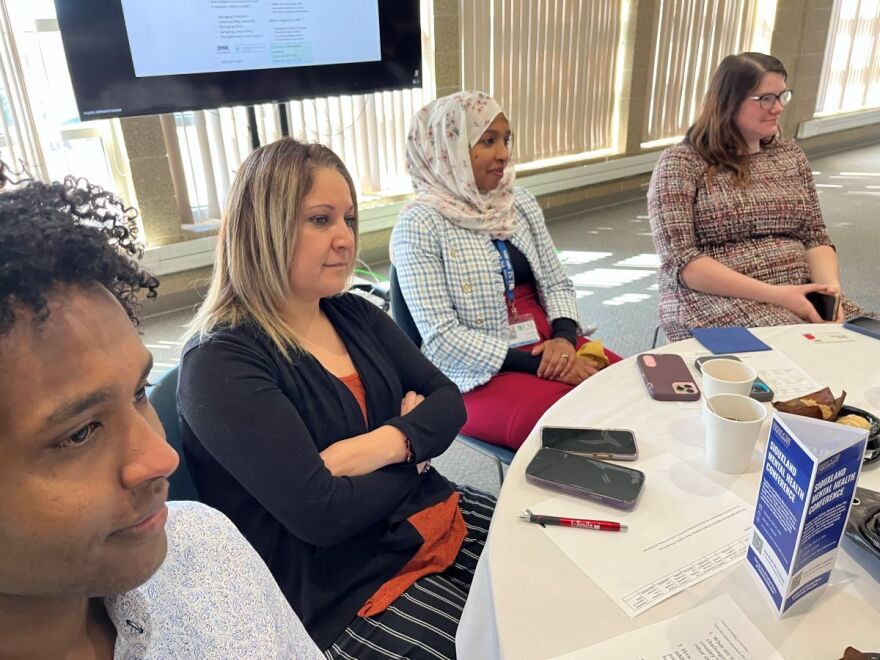 Fatiya Adam, an employee of Lutheran Services in Iowa (third from the left), attends a conference on refugee health care at Briar Cliff University on April 12, 2024.