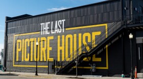 Exterior of a building with the words "The Last Picture House" painted across the side.