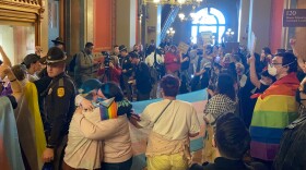 people protest a bill putting restrictions on transgender iowans at the state capitol