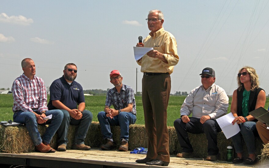 Polk County Administrator John Norris speaks at a farm field day marking the 10-year anniversary of the Iowa Nutrient Reduction Strategy. The county put $12 million from its American Rescue Plan funding into water quality projects including the ICON Water Trails.