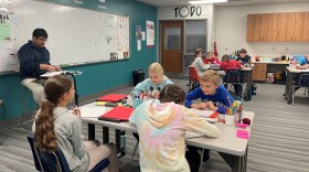 Rogelio Gomez teaches his fifth grade class about division. All of his teaching is in Spanish, and the students only answer in Spanish. Gomez was the first teacher hired in Pella Christian Grade School's Spanish Immersion Program.