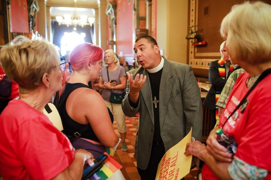  Arguments broke out between some supporters and opponents of a six-week abortion ban at the Iowa Capitol. 