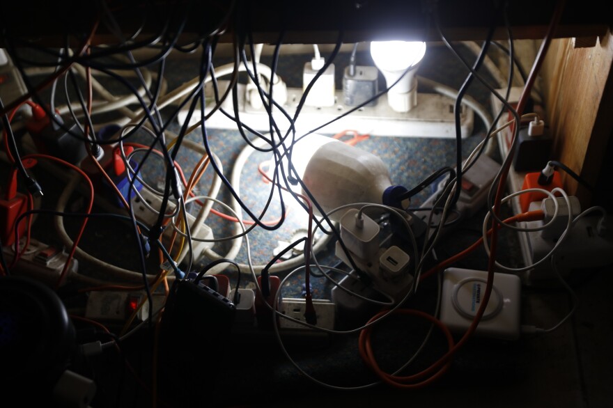 A charging station for cellphones and laptop devices is seen at a bar in downtown Cap-Haïtien, Haiti, on March 17, 2024.