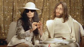 This 1969 photo shows musician John Lennon, right, and his wife Yoko Ono during a press conference. An album, "Gimme Some Truth" by John Lennon, will be released Friday, on what would have been his 80th birthday. (AP Photo, File)