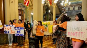 migrant rights advocates rally at the state capitol