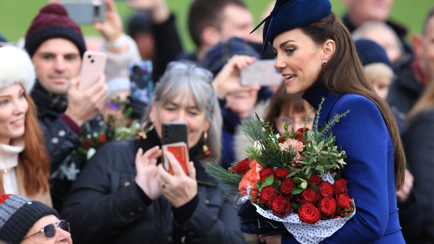 Kate, Princess of Wales, says she edited a photo that seemed to promise to ease concerns about her health — but only raised new questions. She's seen here greeting the public on Christmas Day, last December.