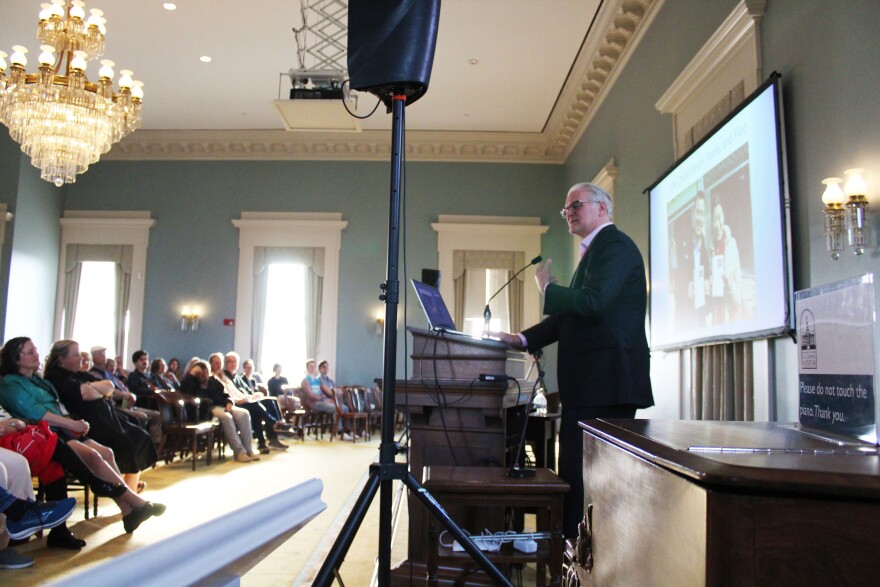 NPR Global Democracy Correspondent Frank Langfitt speaks to a crowd at the Old Capitol Museum on the University of Iowa campus.